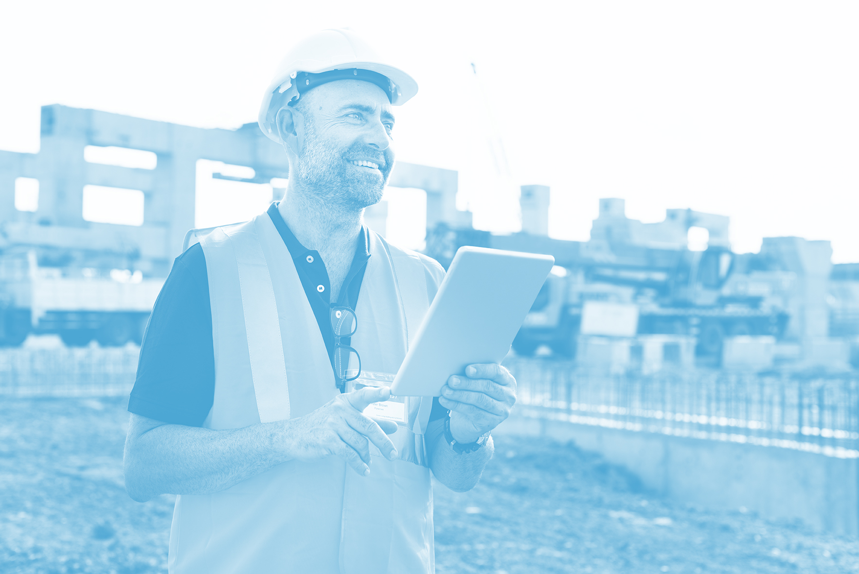 Architecture Construction Safety First Career Concept using software on construction site